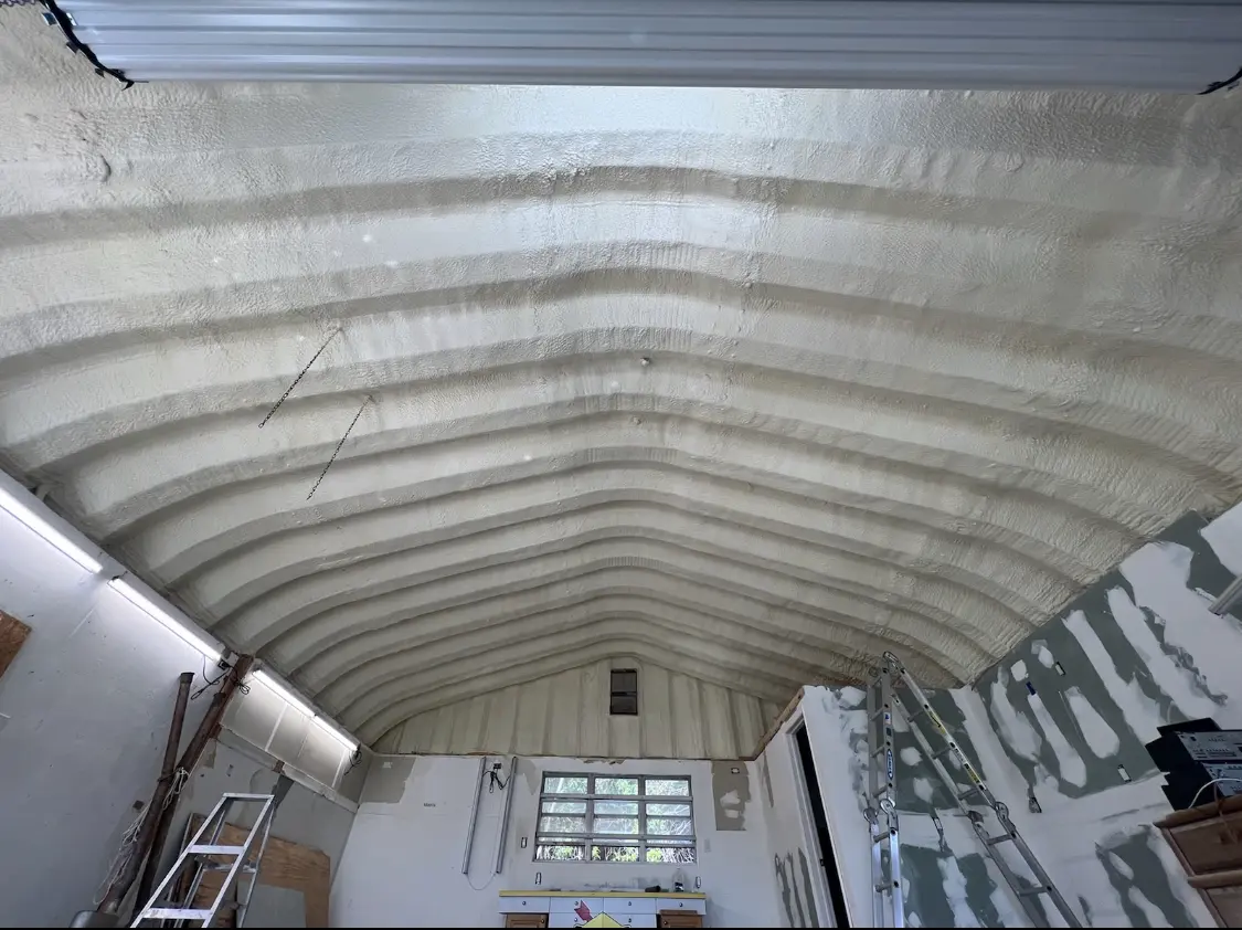 Spray polyurethane foam applied to the underside of a metal roof deck in Spring Garden